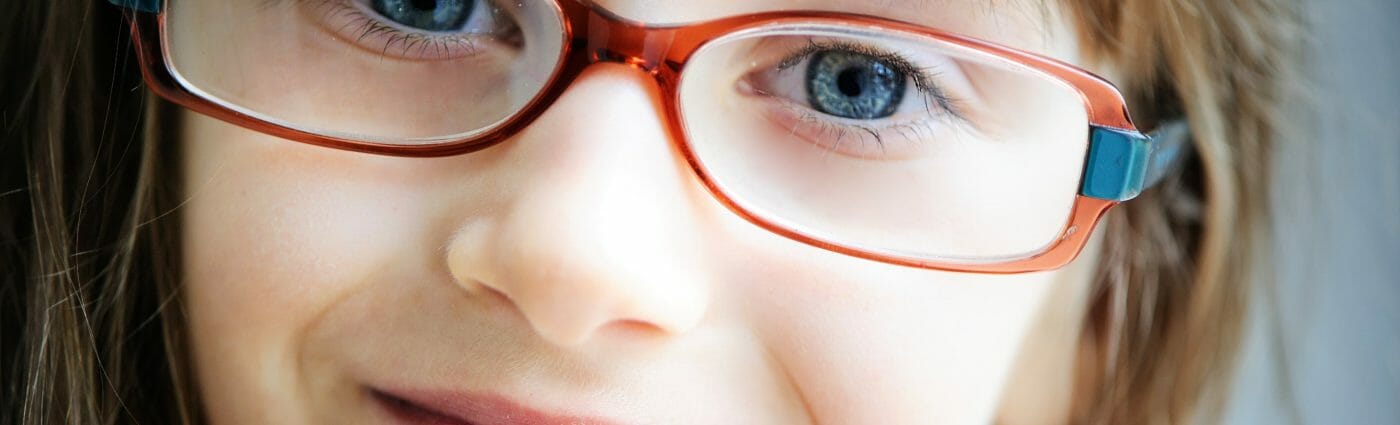 Photo of girl wearing glasses.