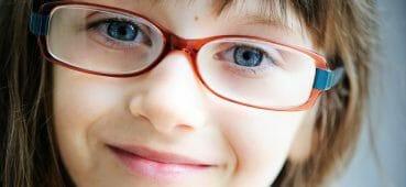 Photo of girl wearing glasses.