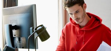 Man studying or working at desk