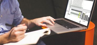 Man using eSystem exam software on a laptop